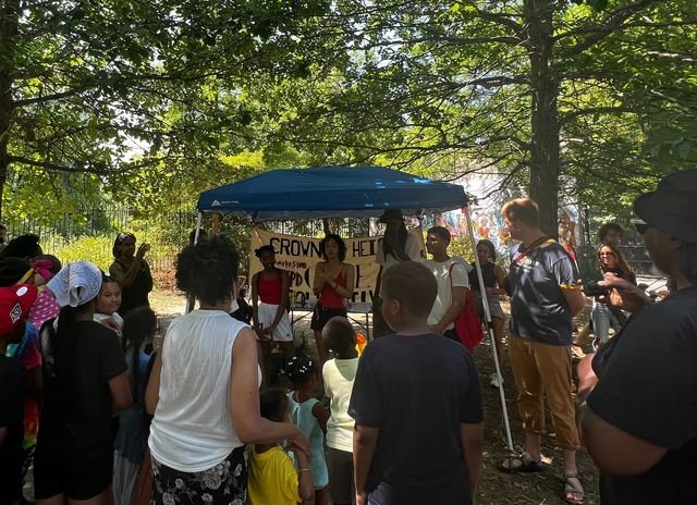Micah Phillips with the group Crown Heights C.A.R.E Collective speaks ahead of the water gun event.